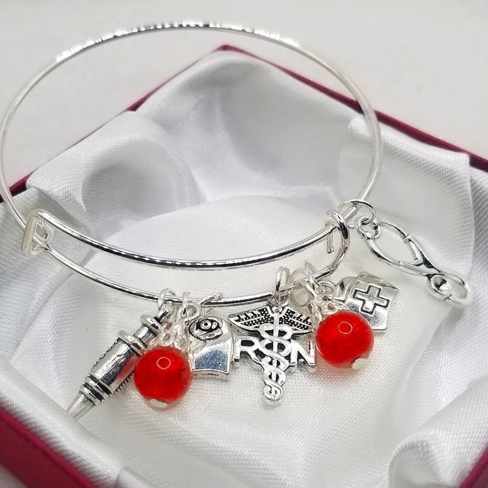 Silver toned hand made RN charm Adustible bangle cuff bracelet.